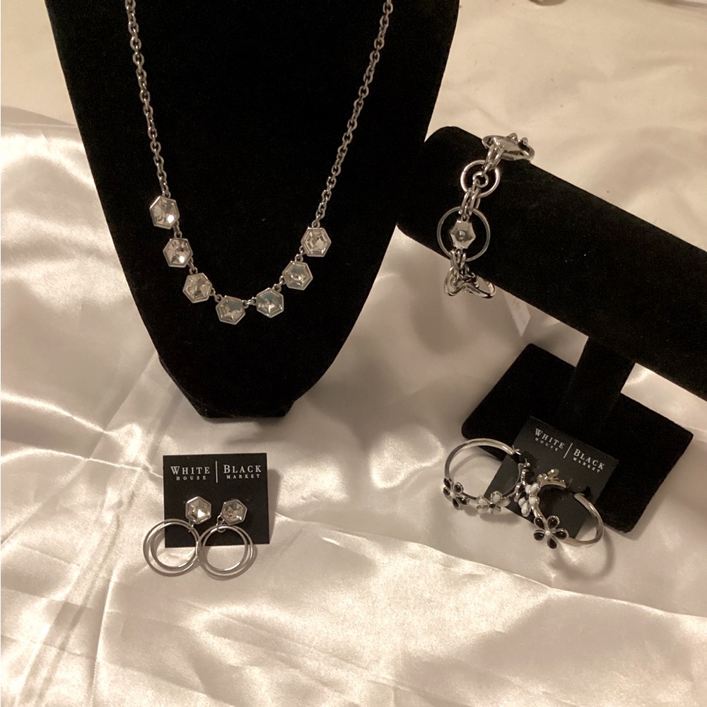 White House Black Market NWT earrings are new on original earring post card.